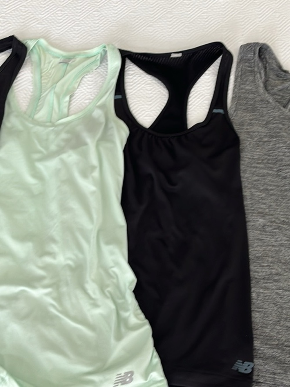 New Balance Racerback Tank Tops in Mint, Black, and Heather Gray, Light Blue